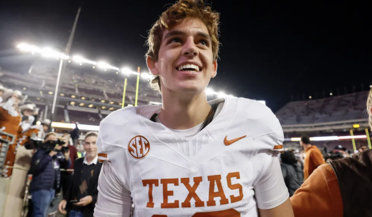 Arch Manning beaming with pride as he walks off the field after the Longhorns defeat rival Texas A&M to win the Lone Star Showdown. 